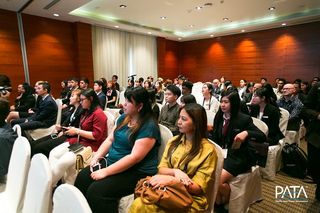 Picture of delegates watching a presentation at the PATA Annual Summit. 