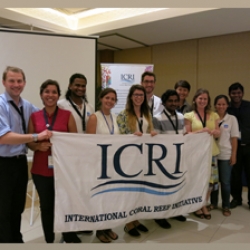 Picture of Reef-World staff with Green Fins national teams at the ITMEMS5. They are holding an ICRI banner. 