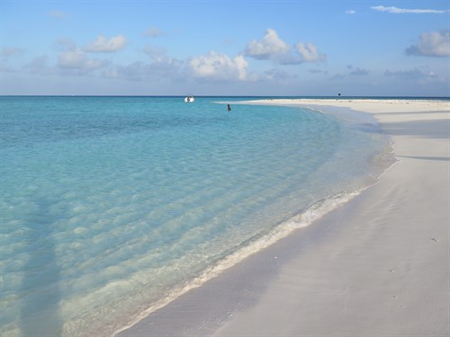 Picture of a beach and the ocean in the the Maldives. 