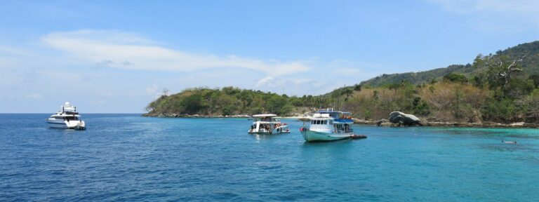 Picture of boats on the ocean in Thailand.