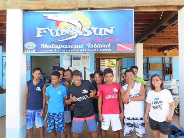 Picture of Green Fins members in Malapascua outside a dive shop. 