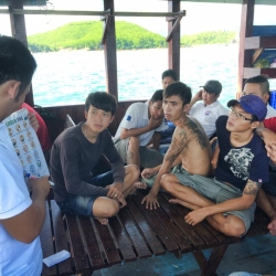 Picture of the Green Fins Vietnam team meeting with dive centre staff. 