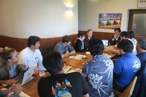 Picture of the meeting between Mel and Chloe from Reef-World with the team from Onna Village. 