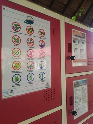 Photo of Green Fins posters on display on lockers at a dive centre. 