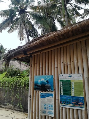 Picture of Green Fins posters and guidelines outside a dive centre. 