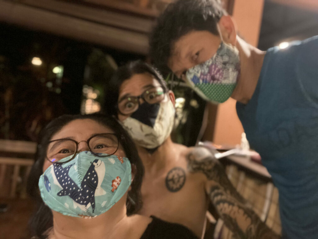 Photo of the Bubbles Dive Centre team wearing reusable fabric face masks. They are one of three winners of the Green Fins 2020 award.